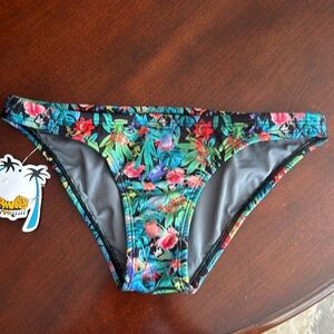 Brand new Jolyn “Bali” bikini bottoms. Size Medium(fit is small)
